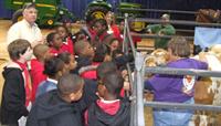 children with cow at Ag Expo